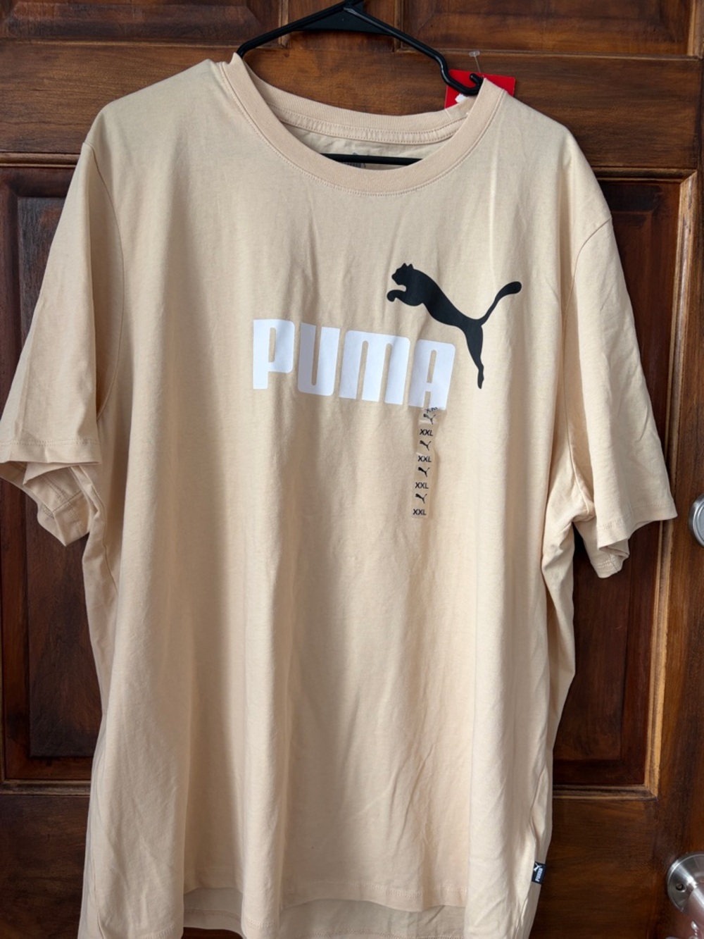 Puma Sand Short Sleeve Logo Tee with Black Cat Emblem